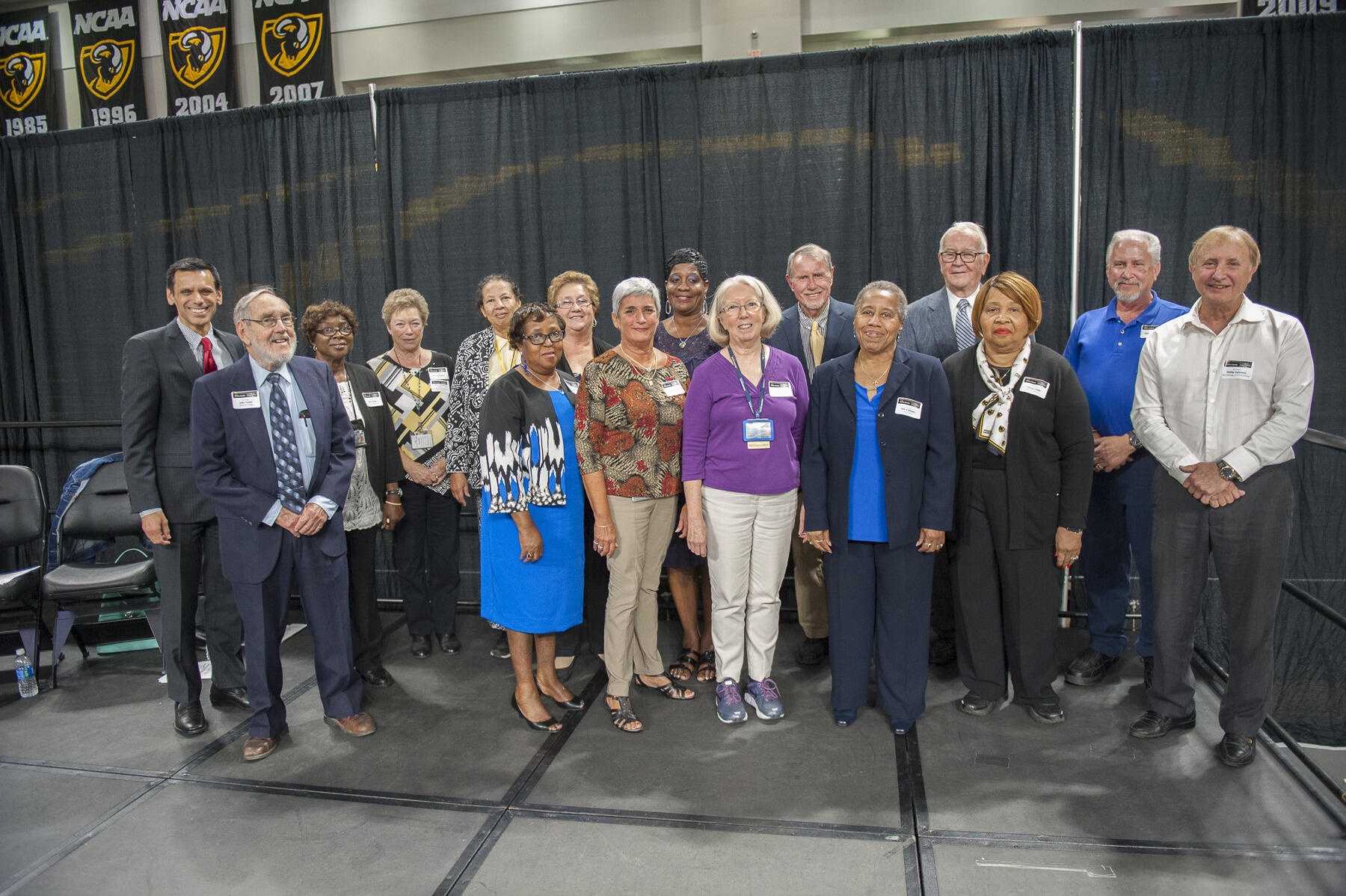 Dr. Rao, far left, poses for a photo with faculty and staff celebrating 45 years of service at VCU.