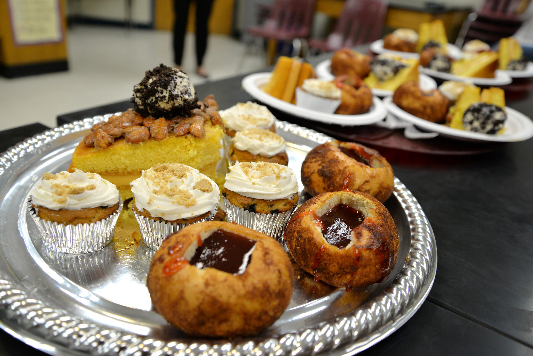 A team pitching "Worlds Collide Bakery" brought trays of samples of their baked goods from around the world. 
