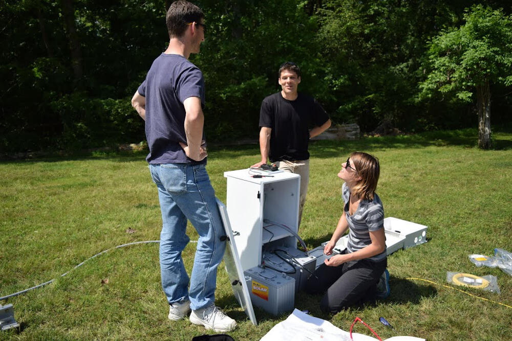 Chris Gough, Ph.D., Scott Neubauer, Ph.D., and Ph.D. student Ellen Stuart-Haentjens during the set up of the flux tower last summer.