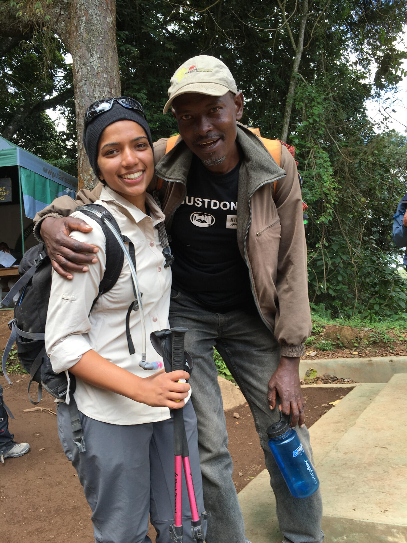 Patel poses with Mount Kilimanjaro guide, Said. 