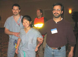 Mass Casualty Exercise. Dr. Stein Bronsky (left) emergency medicine resident and Dr. Sam Bartle, pediatric emergency medicine, assist an injured mass casualty victim, portrayed by 4th year VCU medical student Anna Leung, from the scene of a mock explosion during the interactve training for the mass casualty drill.