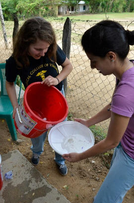 Kate Pearson (rising fourth-year medical student in black T-shirt) cleaning a water filter with Marilena Lekoudis, D.O., (medicine  second-year resident) in La Hicaca, Honduras. Photos courtesy of the Global Health and Health Disparities Program. 