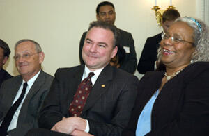 VCU President Eugene P. Trani, Gov. Tim Kaine and Barbara Abernathy listen as longtime colleagues recall Abernathy's many years of service, hard work and dedication to the Carver neighborhood. Photo by Ash Daniel, VCU Creative Services