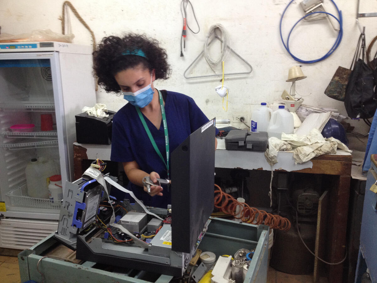 Anisa Kannan, a senior biomedical engineering major, cleans out medical equipment at a hospital in Nicaragua.
