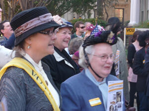 Some participants wore costumes from the early 20th century.  Others wore sashes or carried American flags or signs.