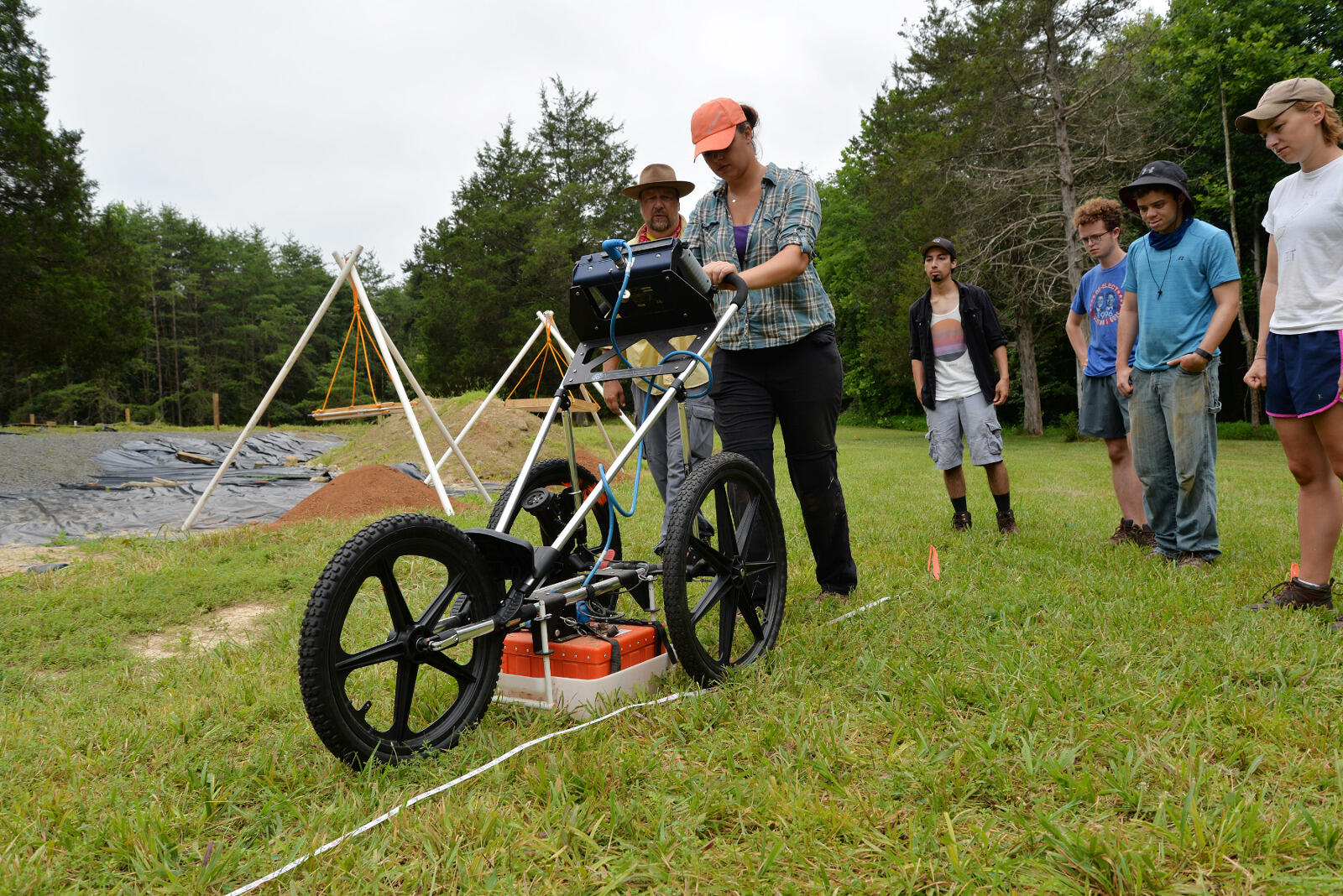 Jesse Adkins, a senior VCU history major, pushes a ground-penetrating radar device to search for buried anomolies at the Fort Germanna/Enchanted Castle site.