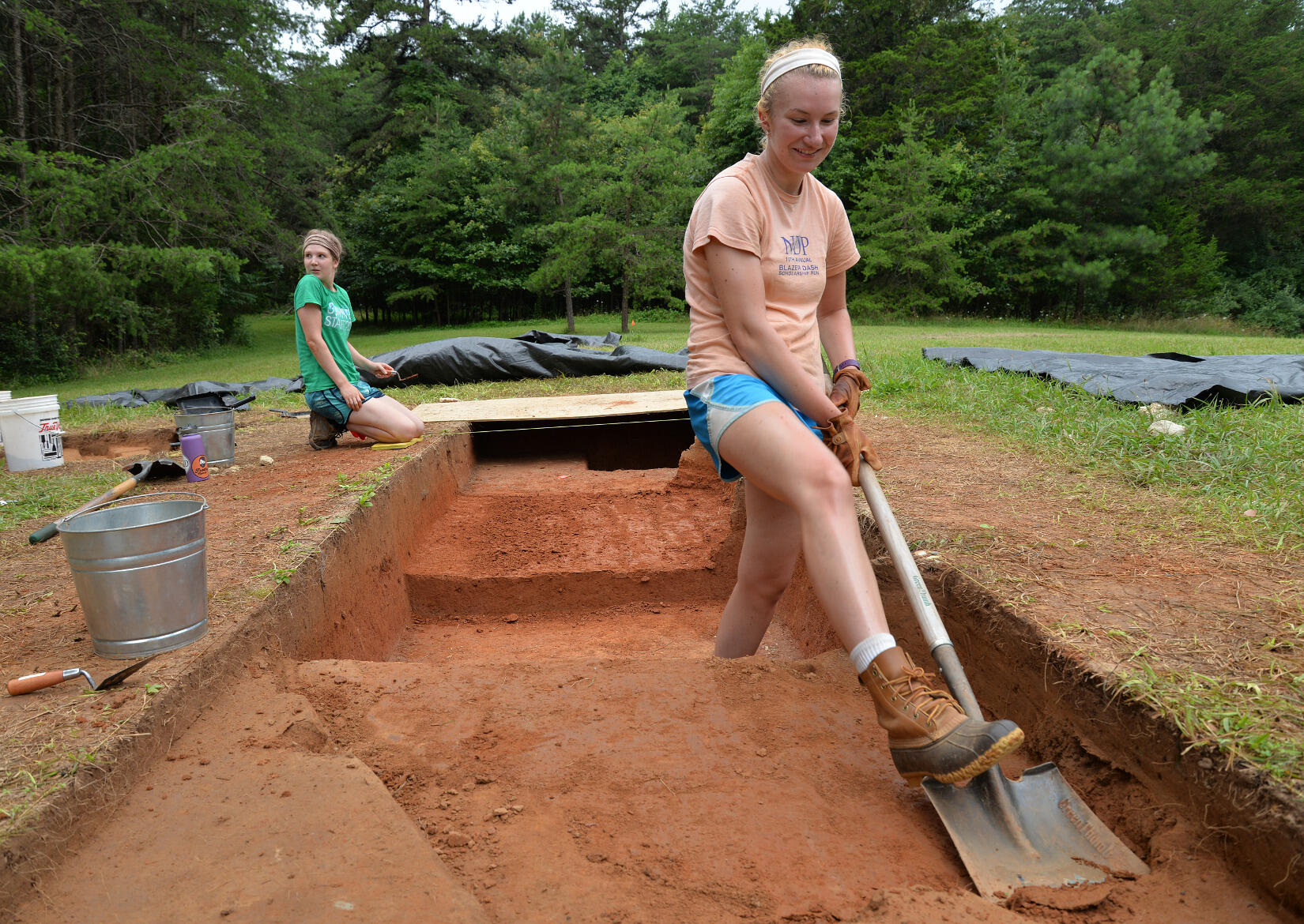 Marissa Kulis, an intern with the Germanna Foundation, excavates a section of the property's field.