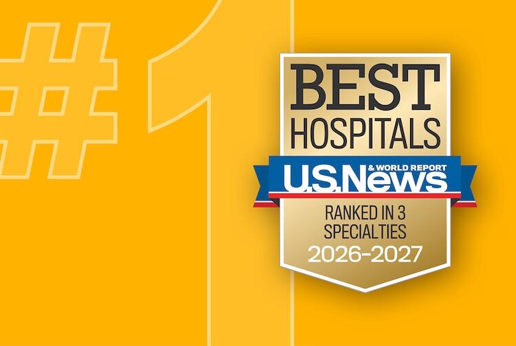 A yellow background with a \"#1\" in a ligher yellow. On top is a seal that says \"BEST HOSPITALS\" \"U.S. News & WORLD REPORT\" \"RANKED IN 3 SPECALITIES\" \"2026-2027\"