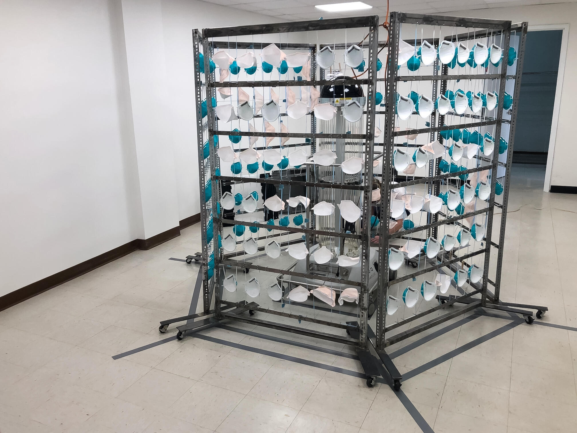 A rack of N95 masks in the process of decontamination.