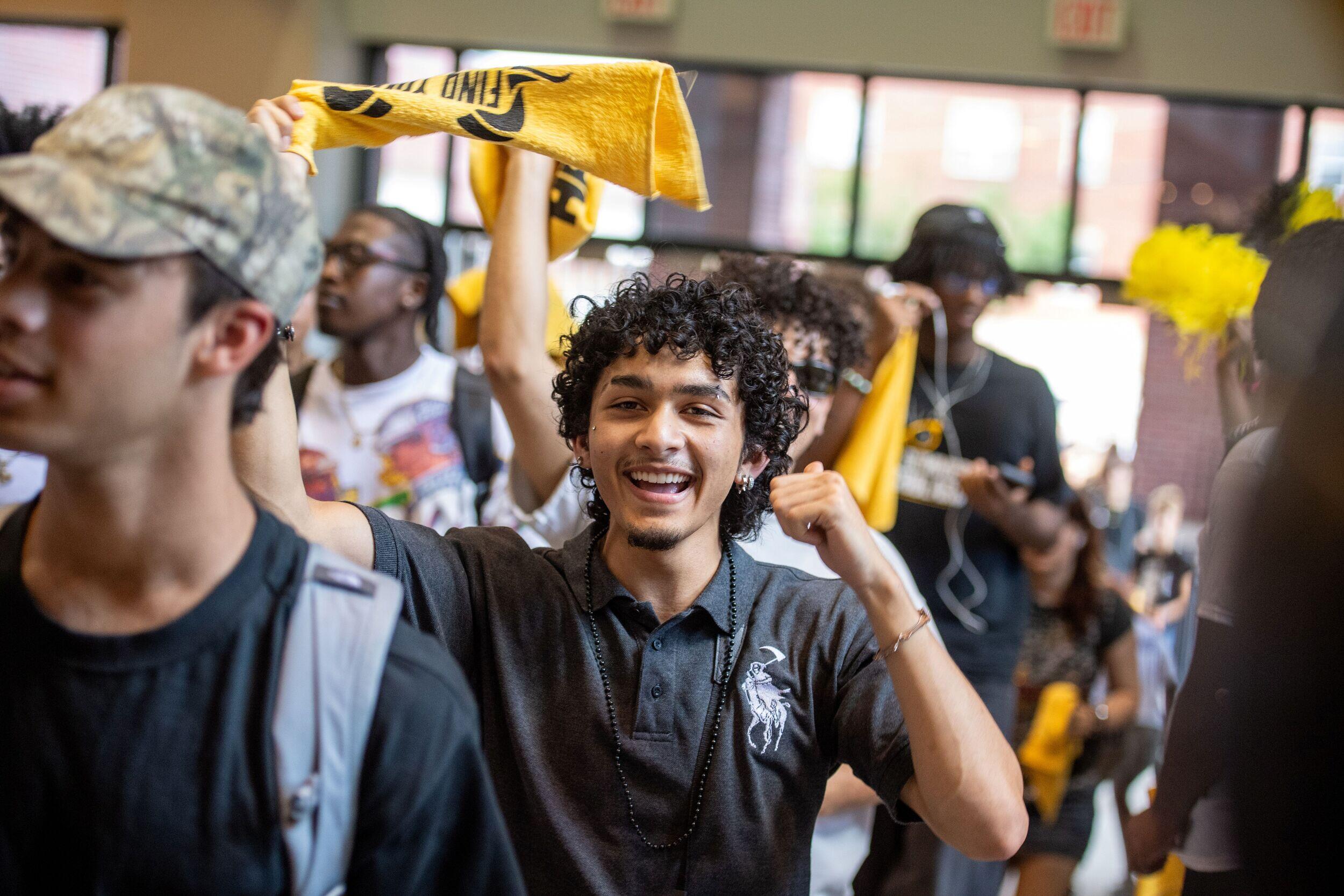A crowd of students celebrate.