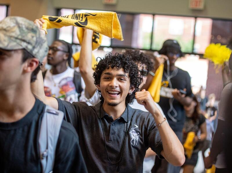 A crowd of students celebrate.