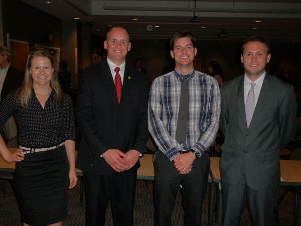 Planning Final Four: From left, <a href="http://www.has.vcu.edu/usp/MURP/">Master of Urban and Regional Planning</a> students JoAnne Simmelink, Billy Moffet, Mark Hill and Garet Prior made it to the final four in the first <a href="http://www.news.vcu.edu/news/May_Madness_at_VCU">Plan Off!!! May Madness@VCU</a>, a round-robin tournament in which nearly two dozen students delivered five-minute presentations about their “studio II” plans to an expert panel of judges. The studio II projects address real planning issues for actual clients.  About 100 people turned out for the event, which was developed by Professor John Accordino. Prior won the competition for his plan to develop and revitalize downtown Hopewell.