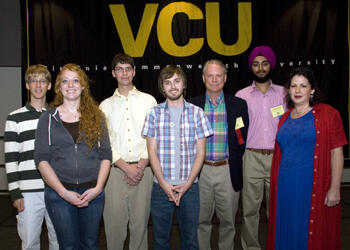 Several of the 2009 Undergraduate Summer Fellows were introduced during the recent “Poster Symposium For Undergraduate Research & Creativity.” From left: Todd Teigeler; Laura Thomas; Phillip Cardwell; Nathan Hilbish; Earl Dowdy, Ph.D., faculty advisory committee member; Kanwar Bir Anand; and D’Anne Graham-Remocaldo. Photo by Melissa Gordon, VCU Communications and Public Relations.