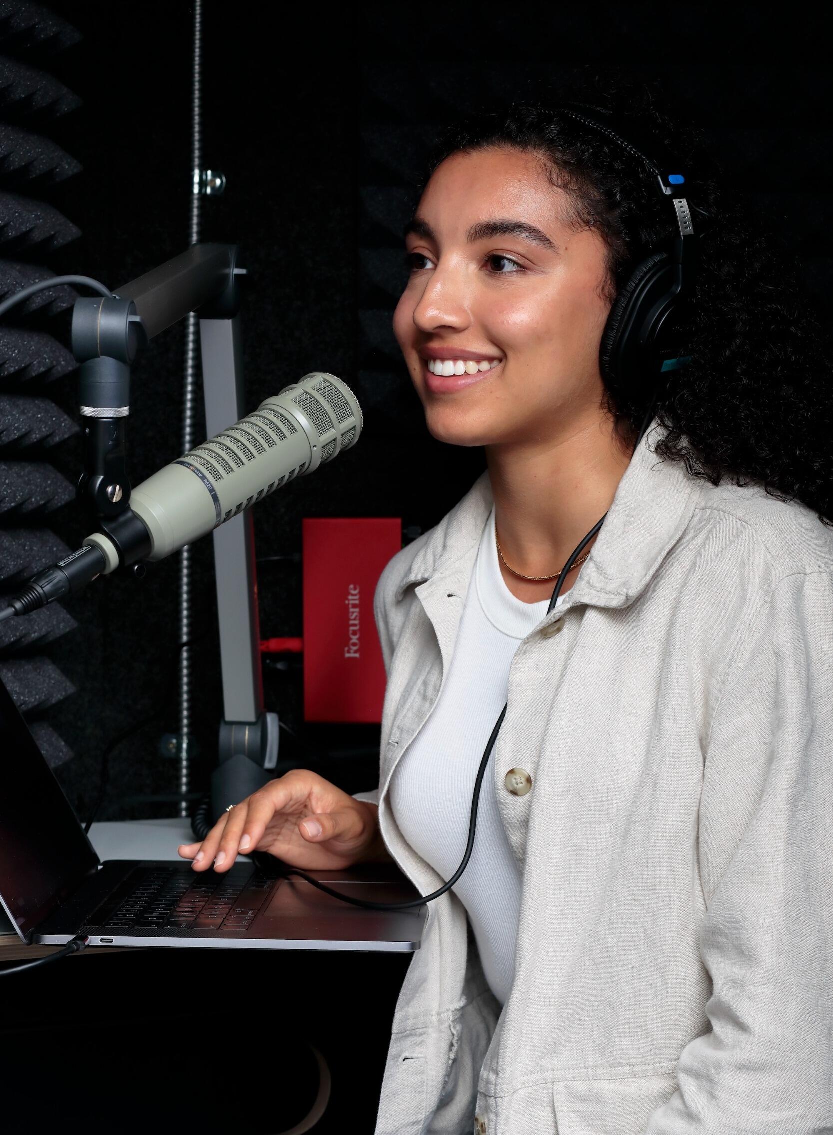 Young woman inside a recording studio
