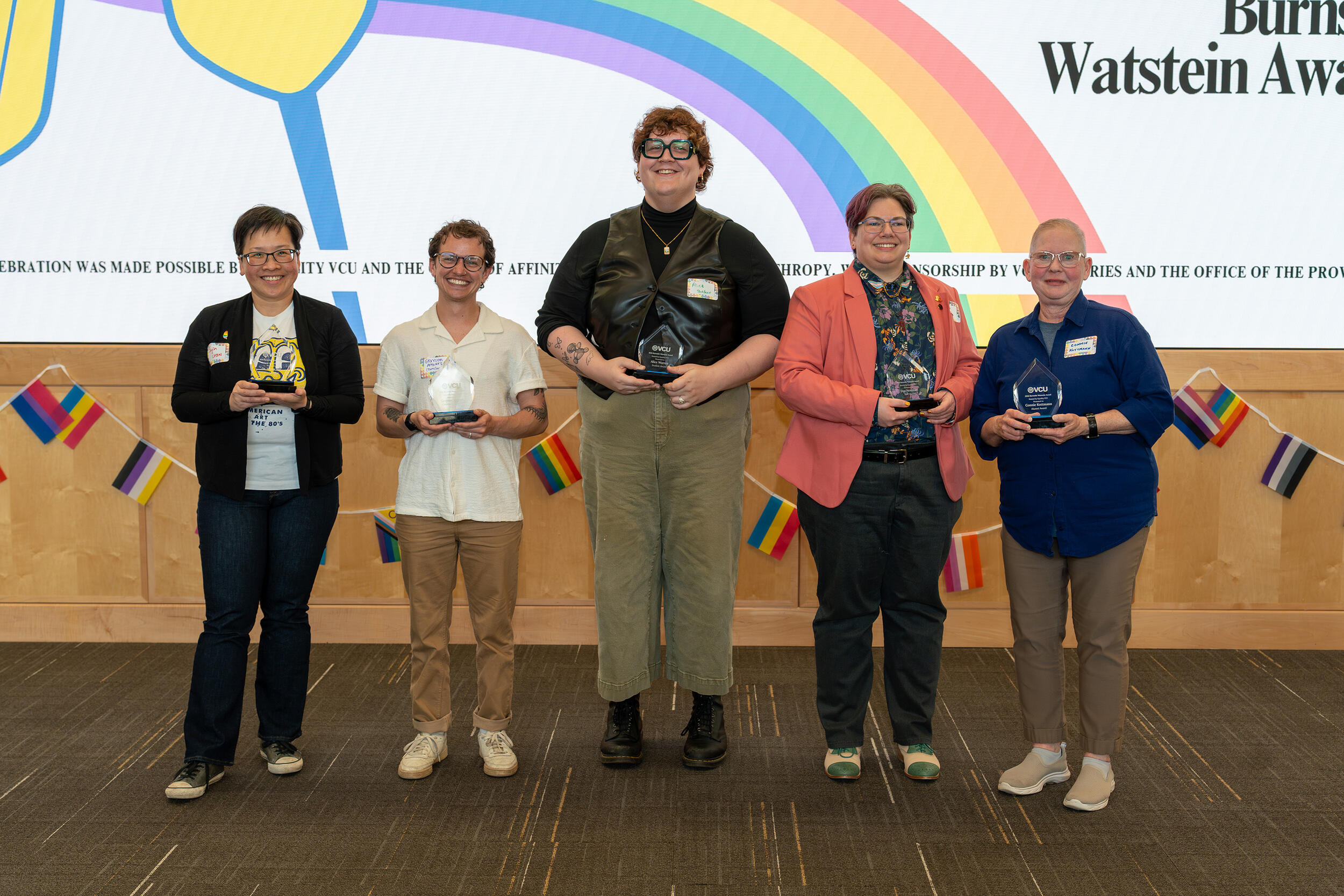 A group photo of five people. 