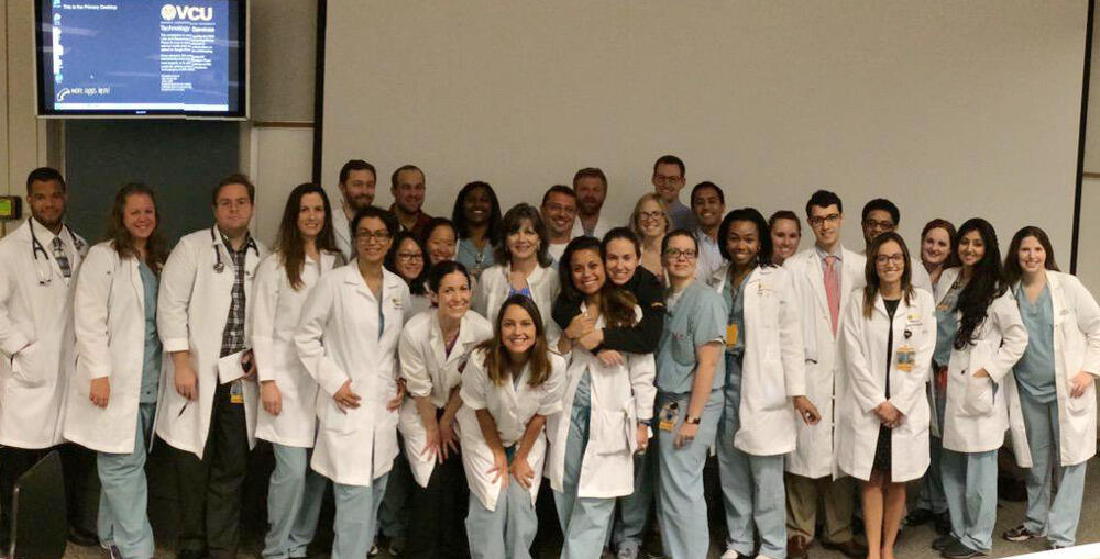 Taken after a grand rounds conference, this image of Paula Ferrada, M.D., with general surgery residents and faculty was tagged #ILookLikeASurgeon to show surgeons don't conform to a prescribed appearance. 
