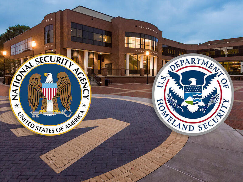 Logos of the National Security Agency and the U.S. Department of Homeland Security overlaying a photo of VCU's Student Commons.