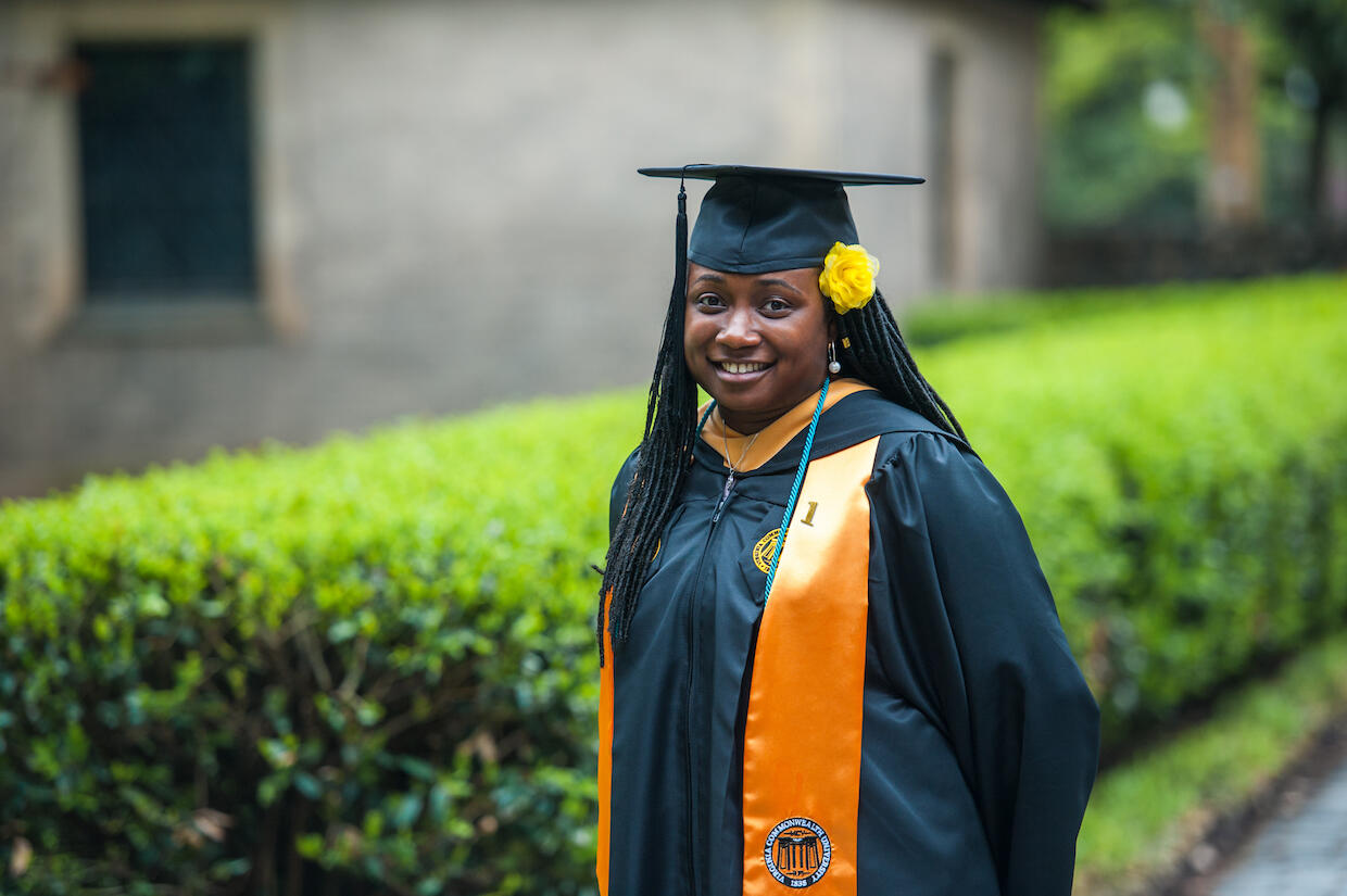 A family of supporters helped Sophia Booker on her path to a college degree. "A lot of people helped me on this journey," she said. "They didn't give up on me. I'm used to people leaving and I built up a wall, but they tore down that wall." (Photo credit: Tom Kojcsich)