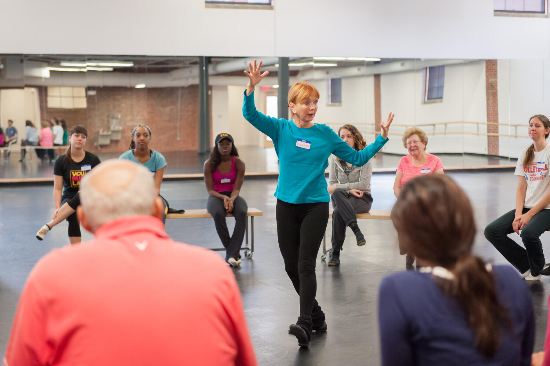 Dance professor Melanie Richards, 69, leads the class in a lesson on expansion and contraction. “I am in awe when we all walk in that door of how completely open and engaged everyone is,” she said. “It’s just pure joy.” 