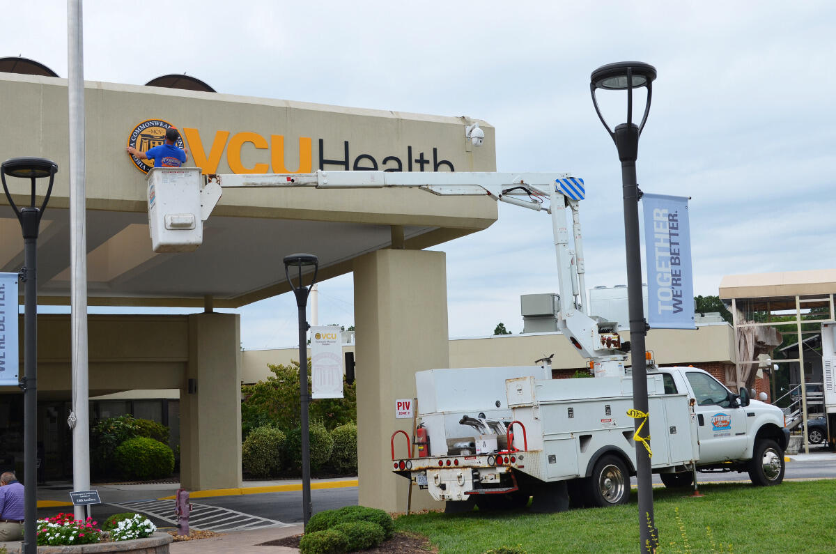 New VCU Health signage is installed at VCU Health Community Memorial Hospital in South Hill.