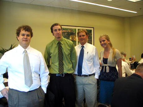 Amani First team members Cory Desloge (left), Nathaniel Green, Kent Kulik and Megan Edwards at the VCU/Association for Corporate Growth Business Plan Competition.