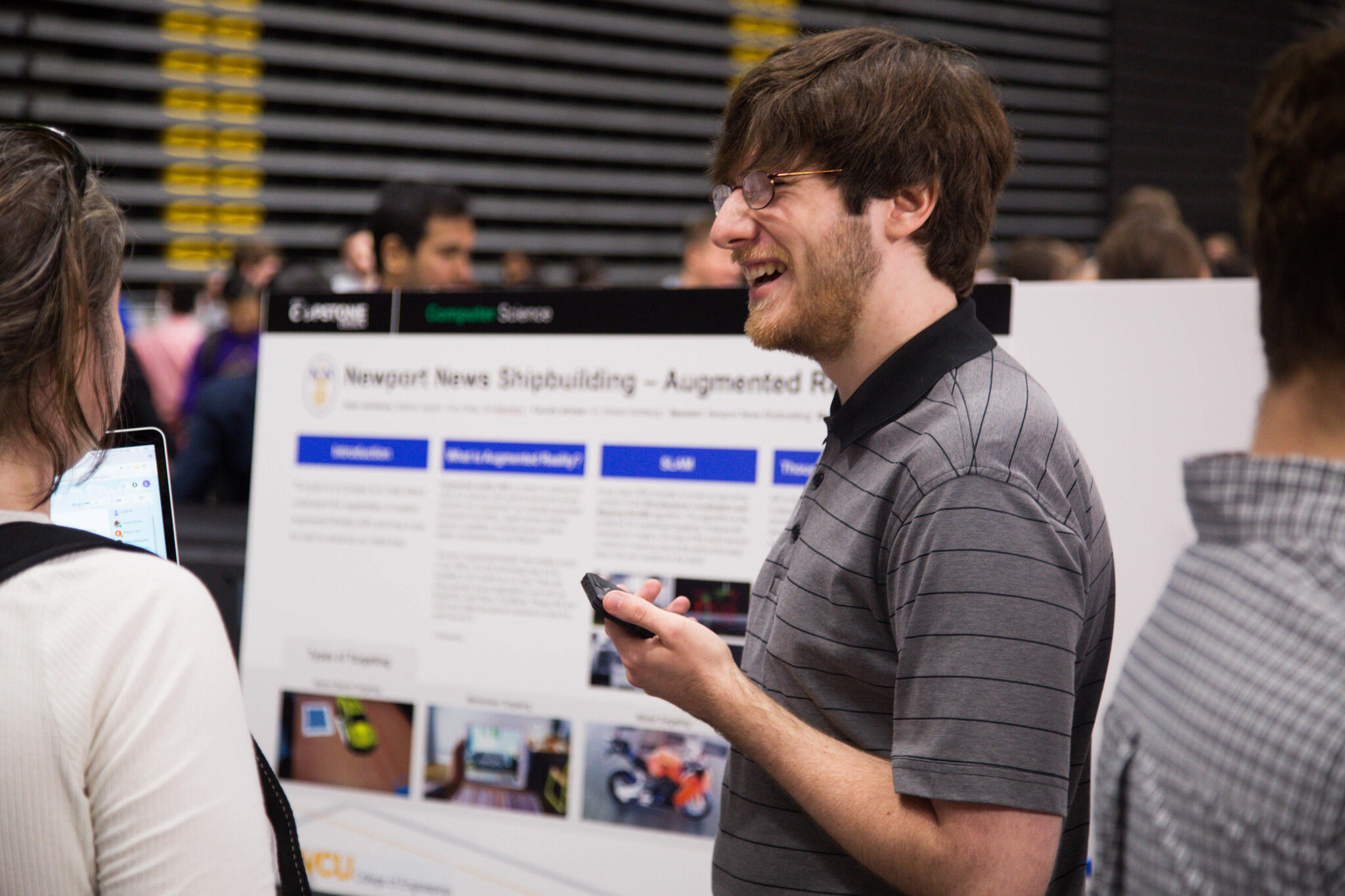 Recent Computer Science graduate Nathaniel Ingram discusses the augmented reality app that his team developed at the 2018 Capstone Design Expo. (Photos courtesy of VCU College of Engineering)