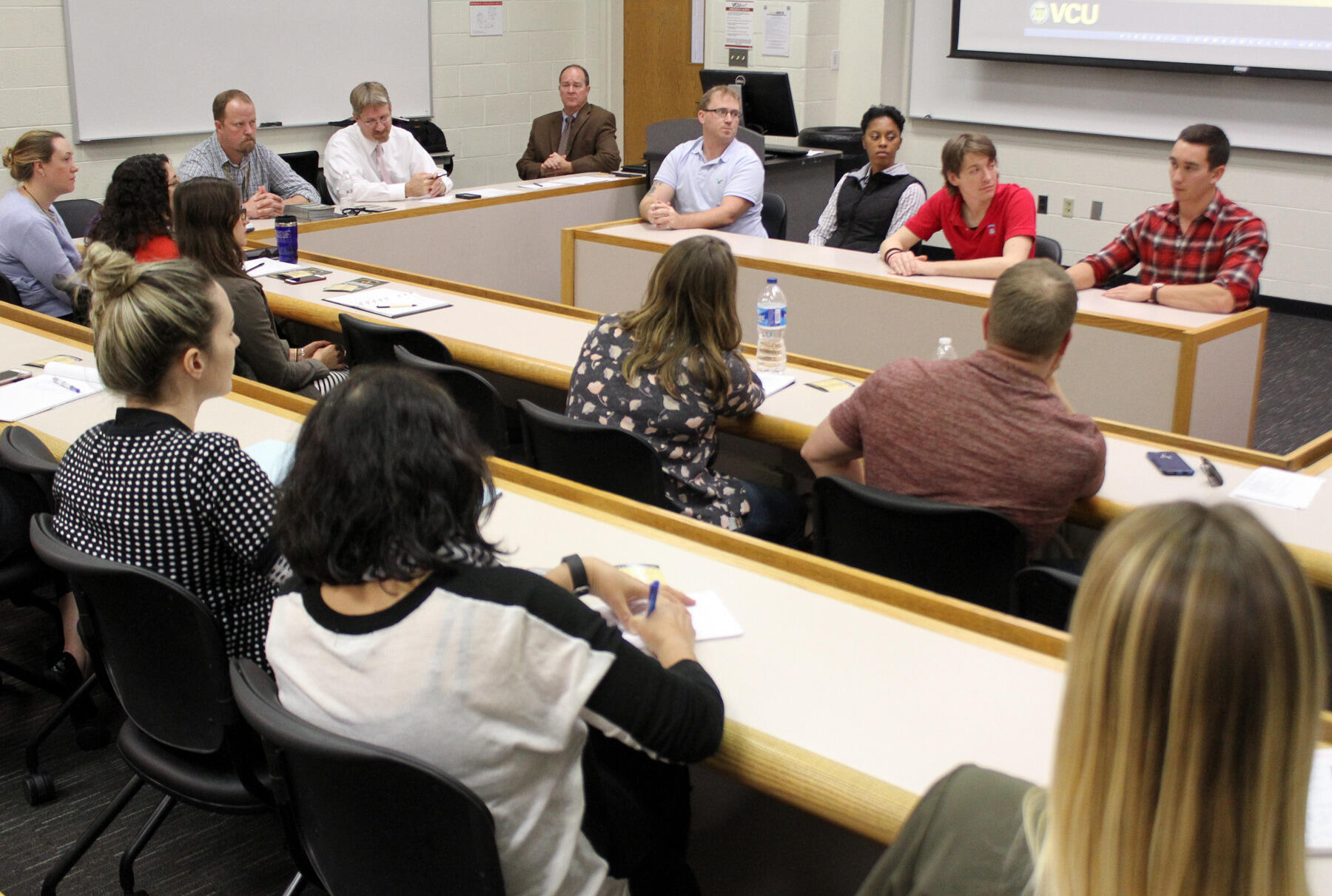 Student veteran and active duty panelists answer questions during the student panel portion of the Green Zone training.