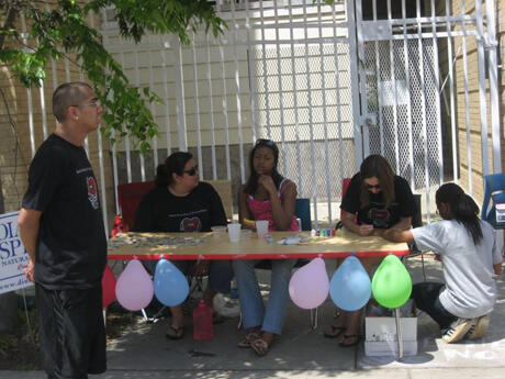 Students in a VCU business class worked with the partnership to organize and manage the event as a class project.  The students created t-shirts that read “REACH – Rams Extending a Caring Hand.” Photo provided by Ronald Brown, program coordinator, Carver-VCU Partnership.