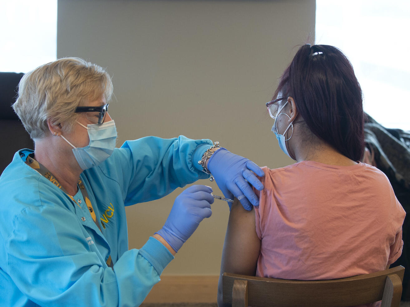 A VCU student receives a COVID-19 vaccine