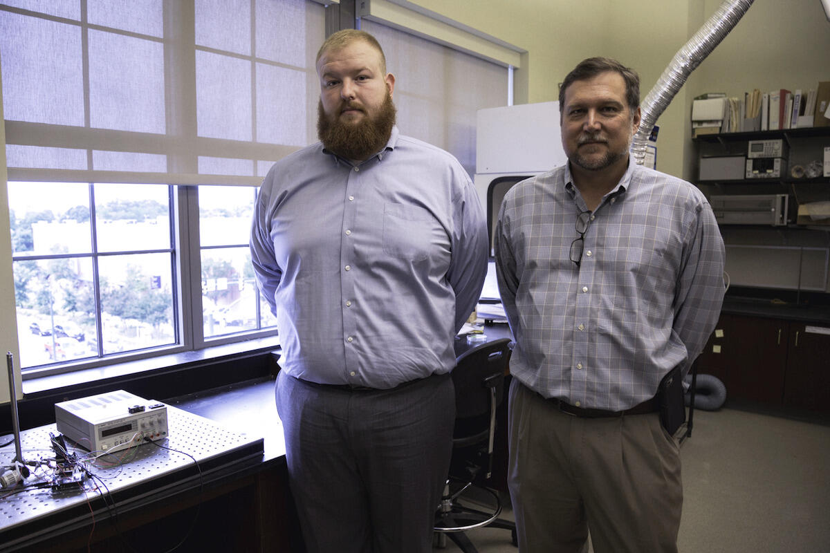 Ph.D. student Brandon Dodd, left, and Gary C. Tepper, Ph.D., chair of the Department of Mechanical and Nuclear Engineering.