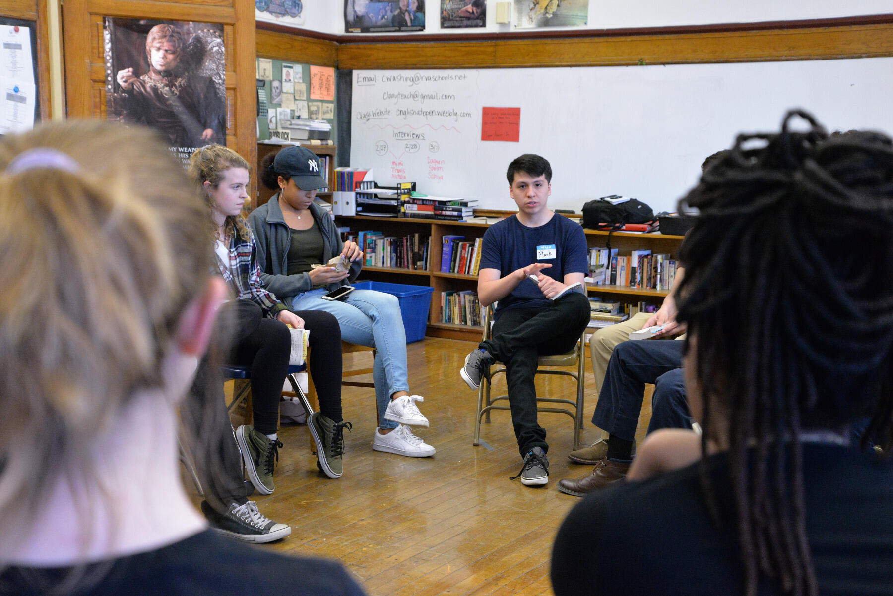 VCU student Mark Antezana asks an Open High School class questions about prison and juvenile justice as part of a discussion on "Just Mercy."