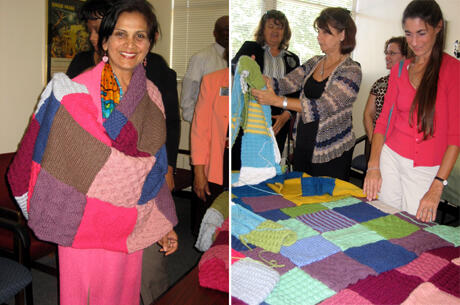 At left, Aradhana Bela Sood, M.D., medical director of the VTCC, wraps herself in one of the soft, hand-made blankets donated by the Weinstein Jewish Community Center Knitzvah Knitters. The Weinstein Jewish Community Center Knitzvah Knitters began meeting in June of this year. The goal of the project, spearheaded by Rhona Arenstein with the Weinstein JCC, was to knit blankets for children in acute or residential care at the VTCC that will provide them with comfort and security as they go through treatment. The group started with three or four women, but has now grown to approximately 70. Each blanket is made up of 28 squares. Pictured at right, Jean Hovey-Murray (left), Rhona Arenstein (JCC), Rebecca Winston (JCC) in back, Devvie Schnur.
Photos by Sathya Achia Abraham, VCU Communications and Public Relatons.