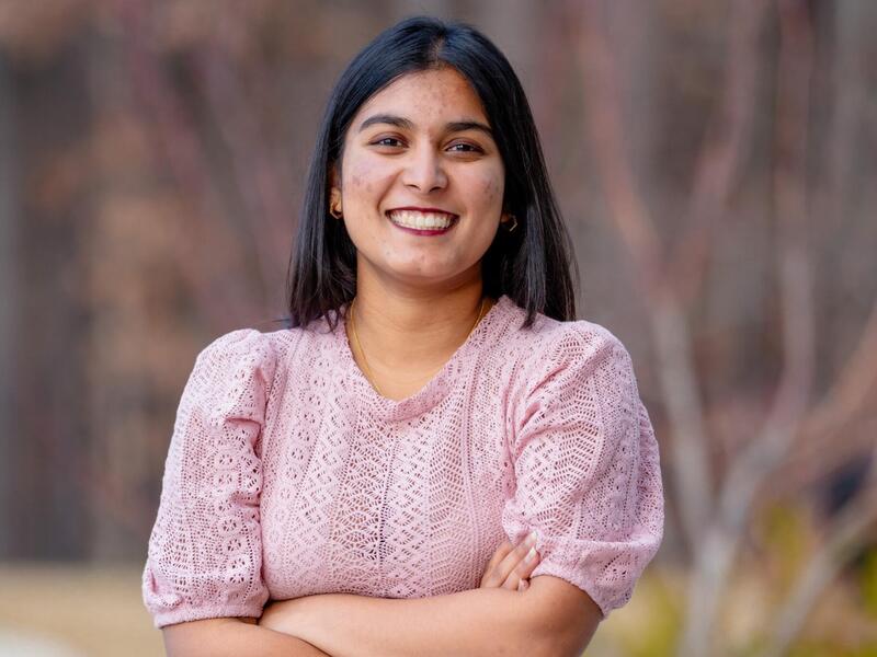 A photo of a woman from the shoulders up. 