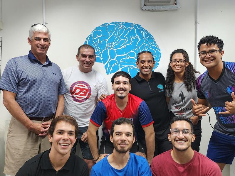 The lab group of UFRN kinesiologist Daniel Machado, Ph.D. (right, standing). Edmund Acevedo, Ph.D., professor in VCU’s Department of Kinesiology and Health Sciences, (left, standing) collaborated with Machado as a Fulbright Scholar in Brazil to examine what predicts the likelihood a person will continue to participate in physical activity. (Contributed photo)