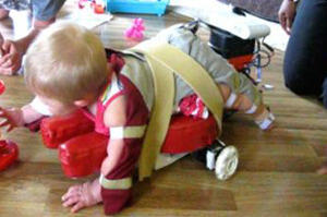 As part of a study, a baby tries out an earlier iteration of the SIPPC.