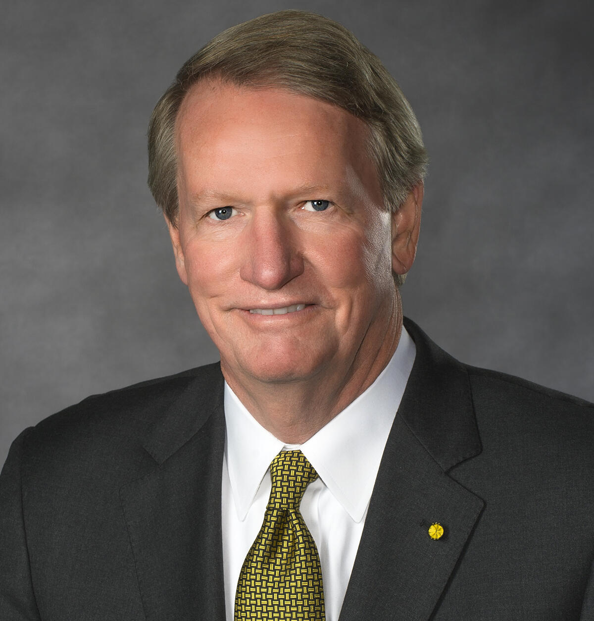 A photo of a man from the shoulders up