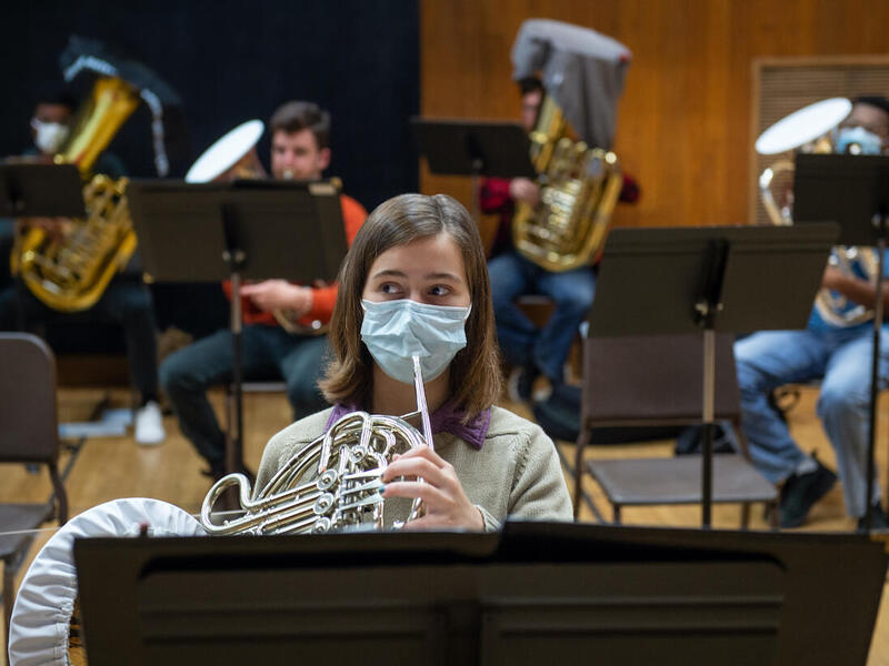 Anna Bon-Harper plays her French horn. (Kevin Morley, University Marketing)