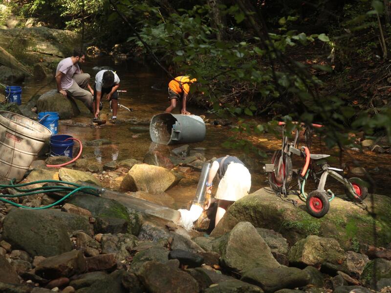 The Loose Parts project’s first event, “The Fountain,” transformed a portion of Reedy Creek in Forest Hill Park into a temporary adventure playground. (Courtesy photo)