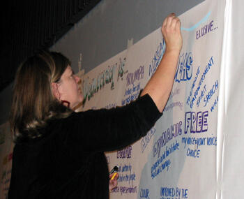 Participants were encouraged to write down their thoughts about democracy and inclusion.  Photo by Mike Porter/VCU Office of University News Services. 