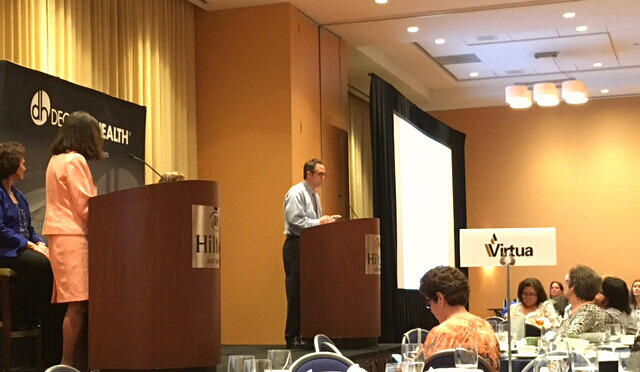 Jay Holdren, director of geriatric services for VCU Medical Center, accepts the award on behalf of the Center for Advanced Health Management.