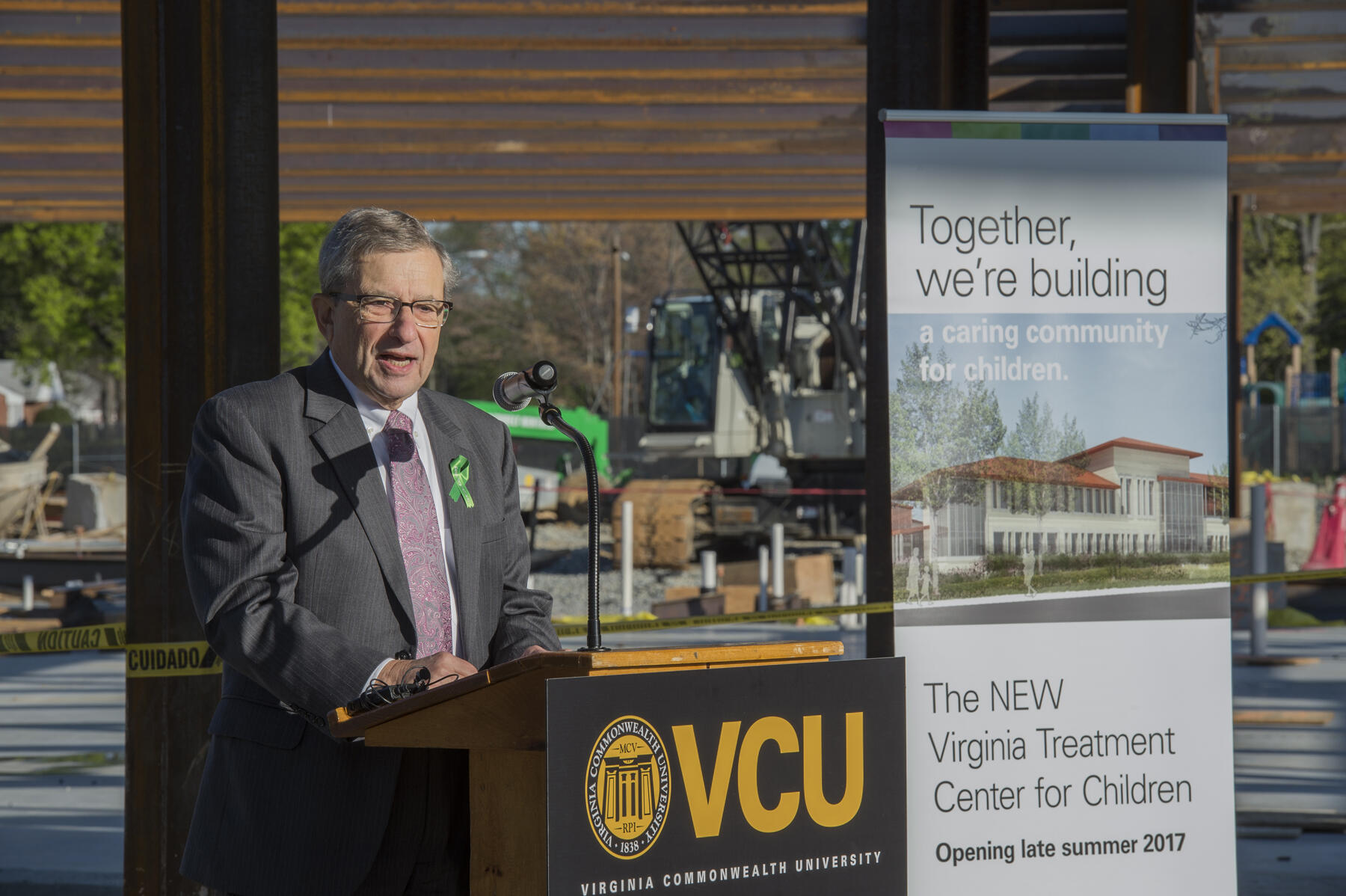 Joel Silverman, M.D., chair of the VCU Department of Psychiatry in the School of Medicine, said the steel beam is a metaphor for strength, the strength of VTCC’s mental health team and the families it serves. 