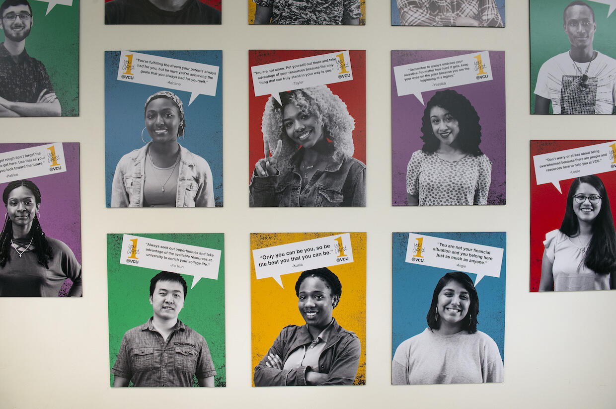 art exhibit of portraits of first-generation college students on a wall