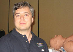 Simulation Doctor. Dr. Marsh Cuttino, director of VCU's Virginia Disaster Readiness Center wrote the mass casualty scenario software for the human patient simulator seen in the background.

Photos by Michael Ford, University News Services