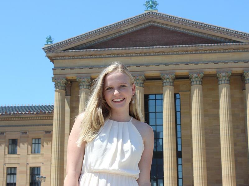 Katherine Berry standing in front of a building 