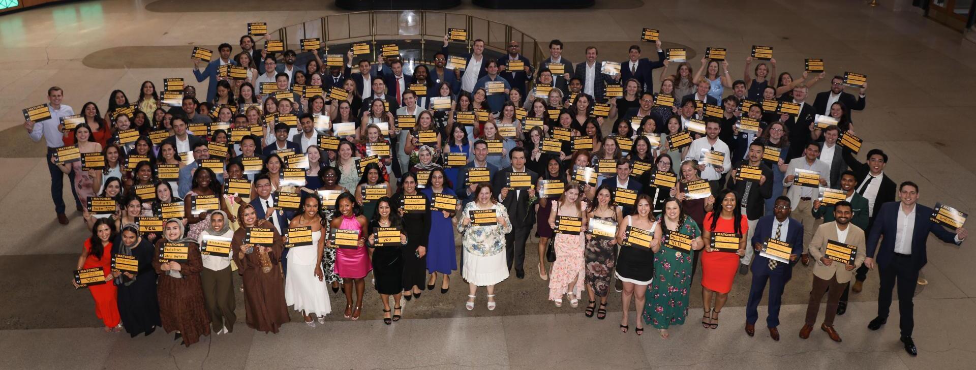 A photo of a large crowd of people. 