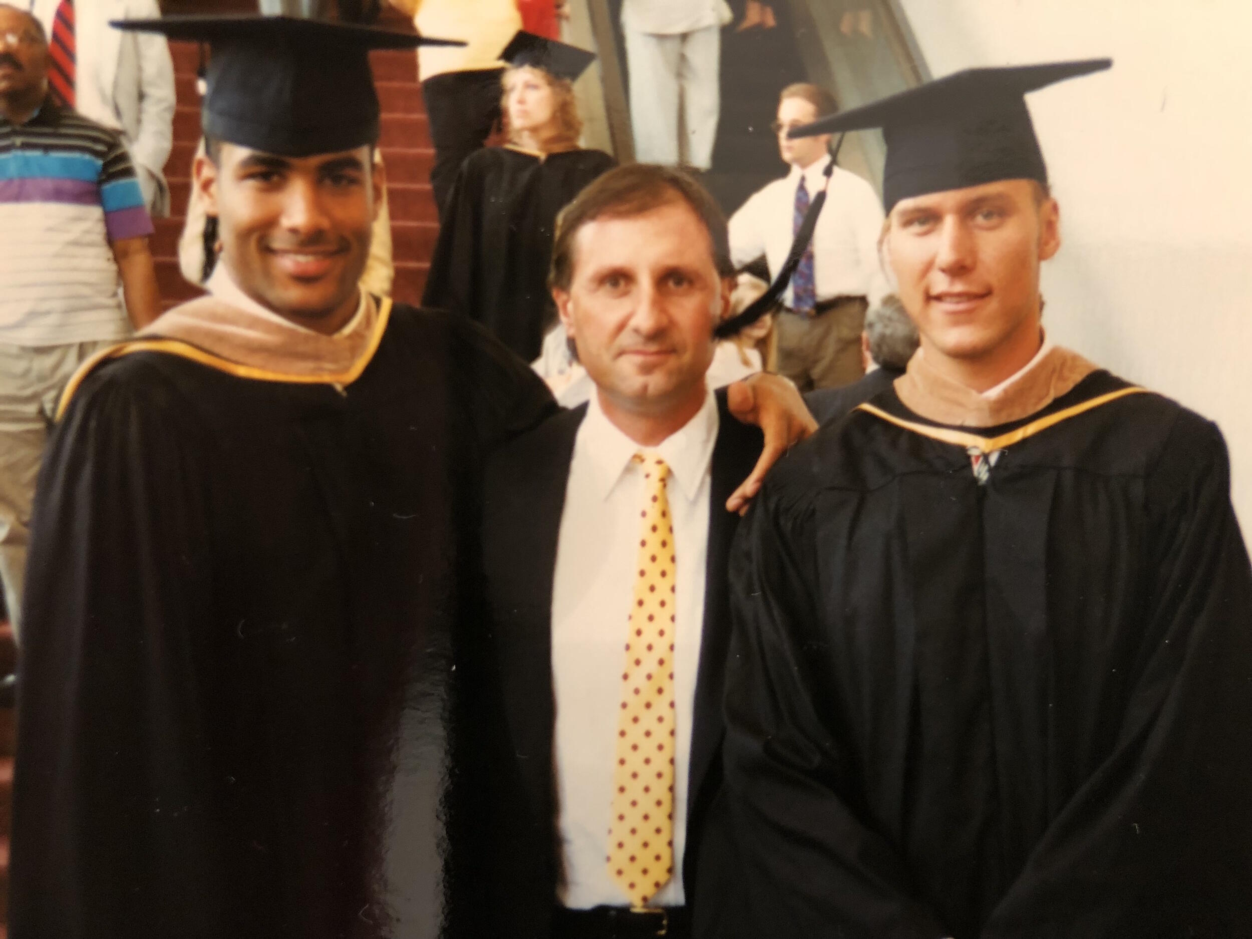 Boris Kodjoe celebrates at his graduation ceremony in 1996 with VCU tennis coach Paul Kostin (center) and his "twin," Jonas Elmblad. (Photo courtesy of Jonas Elmblad)