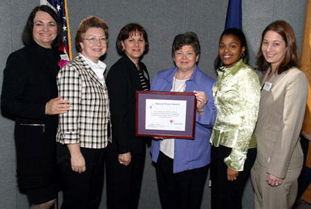 Sarah R. Wilson (left), director of the Department of Human Resource Management, presents an award to representatives from VCU and the VCU Health System combined campaign: Connie Davidson, Co-chair Debbie Fitzgerald, Co-chair Deanna Lacy, Keysha Foster and Sue Anne Kinelski.

Photo courtesy Virginia Department of Human Resource Management
