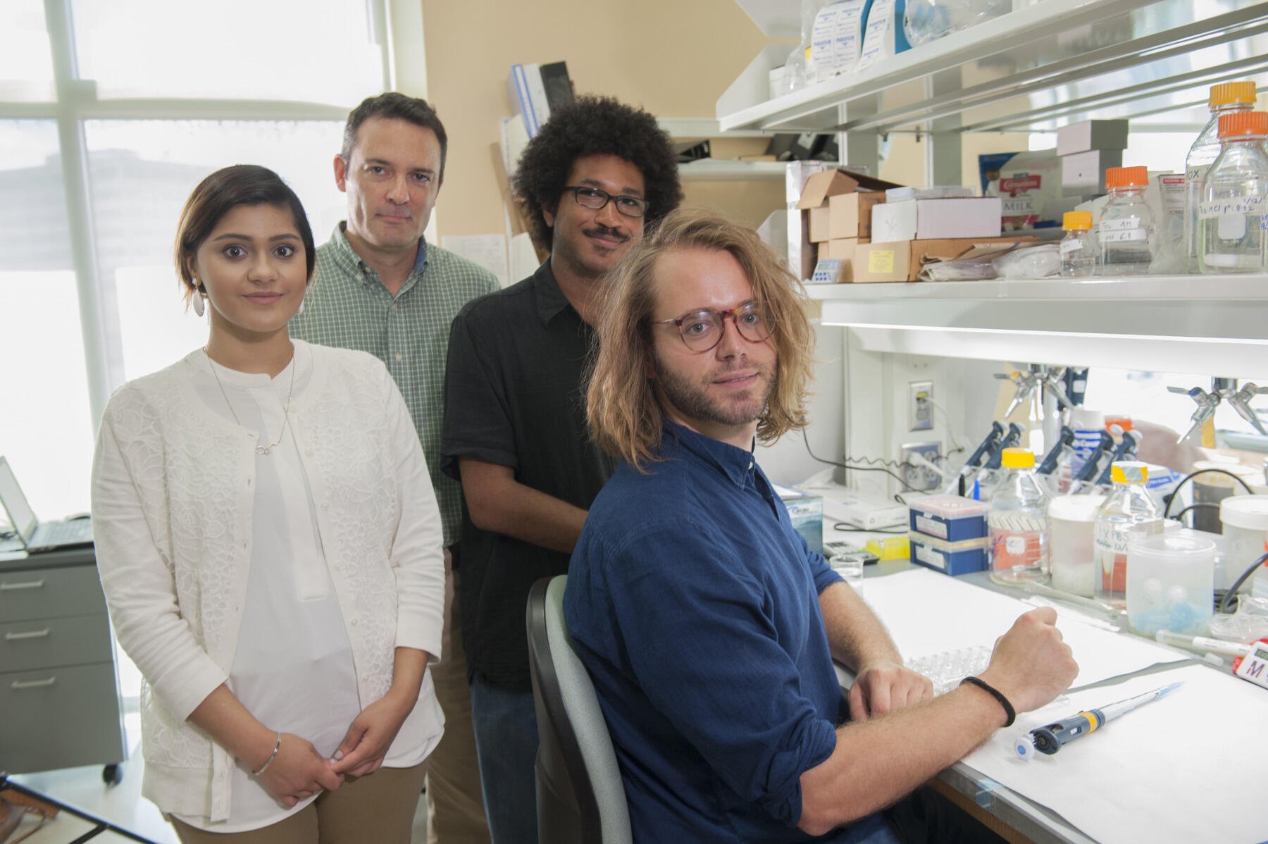 Members of González-Maeso lab group, who worked extensively on the published findings, from left to right: Maryum Ijaz, Javier González-Maeso, Ph.D.; Justin Saunders, Mario de la Fuente Revenga, Ph.D. 
<br>Photo by Tom Kojcsich, University Marketing
