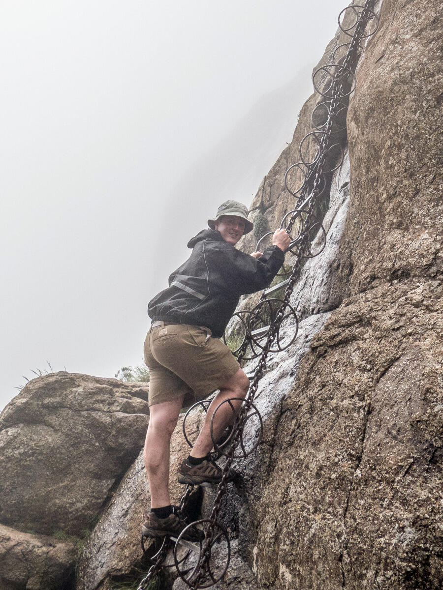 Thomas Vinyard III ascends the famed chain ladders route in the Drakensbergs.
<br>Photo by James Vonesh.