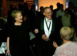 Dr. Drain and his wife, Cindy, are introduced to the crowd coming into the ballroom.
